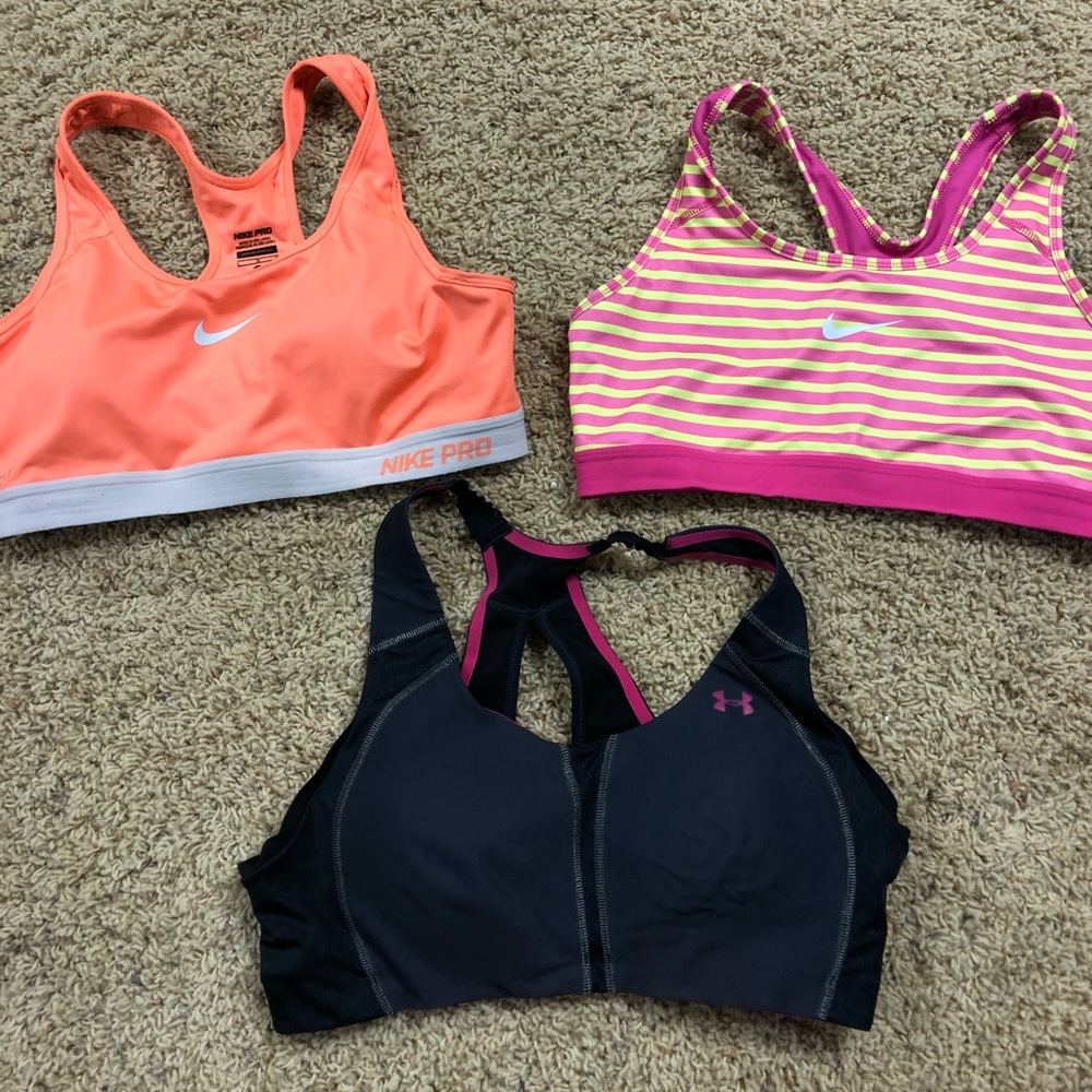 2 Nike and 1 Under Armour sports bras